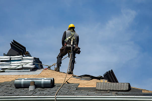 Professional Roof Replacement technician working in Fiskdale, MA